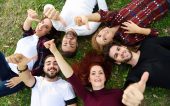 Group of young people together outdoors in urban background